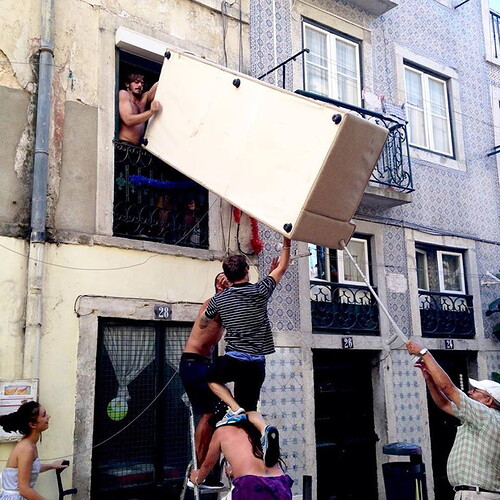 moving_sofa_into_window