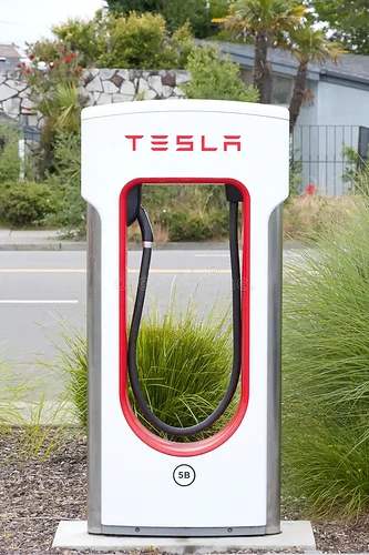 close-up-tesla-supercharging-station-plugged-ev-tesla-supercharger-alameda-ca-may-close-up-tesla-supercharging-station-321443859